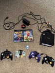 Nintendo Gamecube Black Bundle With 4 CONTROLLERS(1 Oem) 3 Games, 512MB Card Used. Price: $230.00.