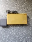Nintendo Lite Pok Mon Edition 4MB Yellow Handheld System Used. Price: $140.00.