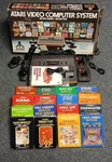 Atari 2600 Complete In Box (cib) Console System & 16 Games Used. Price: $399.99.