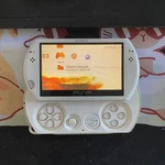 Pre-owned Play Station Portable Sony Go White PSP-N1001 Used. Price: $149.99.