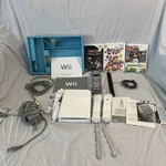 Nintendo Wii Console Bundle - Tested Working 3 Games Two Controllers Used. Price: $114.00.