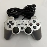 Genuine Sony Playstation PS2 Dualshock Controller Silver Used. Price: $35.83.