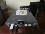 Nintendo 64 NUS-001 Gray Ntsc-u/c W/ 3 Controllers, Mario Used. Price: $120.00.