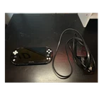Sony Playstation Vita 2000 Black Handheld Console Touchscreen Wi-fi With Charger Used. Price: $185.00.