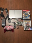 Sony Playstation PS2 Slim Silver SCPH-77001 Controllers Memory Card Games Read Used. Price: $135.00.