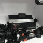Atari 7800 Prosystem Black Silver Console W/ Joystick Paddle Controllers & Games Used. Price: $130.99.