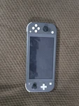 3 Nintendo Switch Lite Gray Handheld System Used. Price: $75.00.