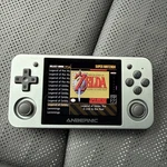 Anbernic RG350M Retro Android Gaming Handheld Console Used. Price: $65.00.