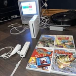 White Nintendo Wii Console W/cords Controller RLV-001 Gamecube Compatible Used. Price: $90.00.