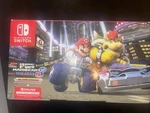 Nintendo Switch With Mario Kart 8 Deluxe Bundle Bowser The Front Of Box New. Price: $400.00.