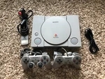 Sony Playstation 1 Game Console - Gray W/ 2 Oem Controllers, Memory Card Tested Used. Price: $110.00.