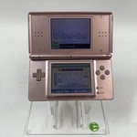 Nintendo Ds Lite Handheld Game Console Only USG-001 Metallic Rose Used. Price: $69.99.