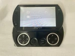 Sony Go PSP-N1006 Playstation Portable Black Used. Price: $160.00.