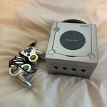 Nintendo Gamecube DOL-001 Silver Console W/ Controller Ntsc-u/c (japan) Used. Price: $90.00.
