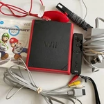 Red Nintendo Wii Mini Console 8GB Mario Kart Video Game Bundle Set Used. Price: $142.00.