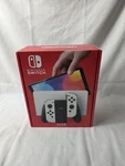 White Nintendo Switch Oled Model HEG-001 Handheld Console & Accessories New. Price: $299.99.