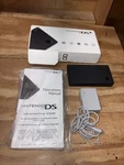 Nintendo Dsi Black Handheld System Box With Charger Replacement Stylus Open. Price: $199.99.