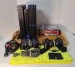 Sony Playstation PS2 Fat SCPH-3001 With Nyko Vertical Tower& Games. Used. Price: $134.99.