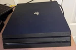 Sony Playstation 4 Pro 1TB Game Console - Jet Black Used. Price: $150.00.