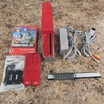 Nintendo Wii Red Console Used. Price: $90.00.