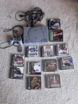Sony Playstation PS1 SCPH-7001 Console Bundle W/ Controller, Memory Card & Games Used. Price: $150.00.