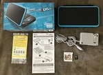 Nintendo 2DS Xl Handheld Black/turquoise W/super Smash Bros. + 4GB Msd - Vgc Open. Price: $350.00.