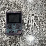 Merkury MI-PGC01 Purple Clear Handheld Video Game Console Rechargeable Battery Used. Price: $13.99.