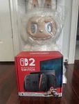 Nintendo Switch 2 Handheld Console System With Mario Kart - Read Slides Open. Price: $200.00.
