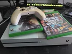 Microsoft Xbox One 500GB With 4 Games And Cords Used. Price: $130.00.