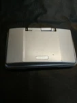 Nintendo Ds Silver Original Handheld Video Game Console Broken Hinge Still Works Used. Price: $55.00.