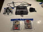 N64 Smoke Black Funtastic Bundle Games + Oem Controller Memory Card Rare Used. Price: $225.00.