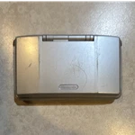 Nintendo Ds Silver Black Console Dual Screen Headphone Jack NTR-001 Handheld Used. Price: $30.00.