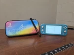 Nintendo Switch Lite, Green Handheld Gaming Console Used. Price: $119.99.