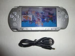 Sony Psp 2001 Slim Launch Edition Handheld System - Silver Used. Price: $150.00.