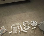 Nintendo Wii Bundle With Controllers, Games, Adapter, And Cases Used. Price: $30.00.