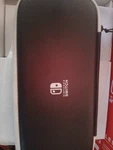 Nintendo Switch Oled Model W/ Neon Red & Blue Joy-con Used. Price: $185.00.