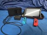 Nintendo Switch V1 HAC-001 Complete With Dock, Charger And Carrying Case Used. Price: $160.00.