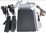 Nintendo Wii Video Game System 2 Remote Bundle Black Console + New Accessories Used. Price: $140.00.