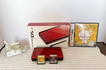Nintendo Ds Lite Crimson/black Handheld Video Game System Used. Price: $130.00.