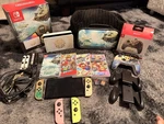 Nintendo Switch Oled Zelda Tears Of The Kingdom Edition W/ Mario Games & Access Used. Price: $550.00.