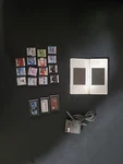 Nintendo Ds Lite Handheld Console Bundle W/ 15 Games, Charger, Stylus - Tested! Used. Price: $115.00.
