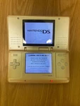 Nintendo White Handheld System - Fair Condition Tested Working Used. Price: $36.00.