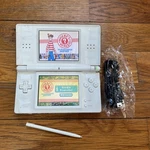 Nintendo Ds Lite Handheld Console - Polar White Game Charger Stylus Works Used. Price: $56.00.