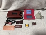 Nintendo Dsi Pink Handheld Console System TWL-001 W/ Games Case Extras Used. Price: $71.95.