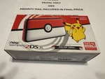 Nintendo 2DS Xl Ball Edition Handheld Console With 5 Pokemom Games Used. Price: $800.00.