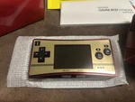Nintendo Game Boy Micro Famicom Console - Red/gold Open. Price: $700.00.