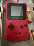 Nintendo Boy Color CGB-001 Berry Pink Handheld Video Console, 9 Games, Case Used. Price: $180.00.