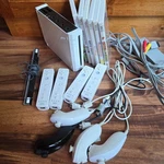 Nintendo Wii Console Bundle W/ Controllers/ 6 GAMES/4 Nunchuck Used. Price: $155.00.