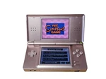Nintendo Ds Lite Video Game Console - Metallic Rose With Charger Works Great Used. Price: $75.00.