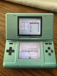 Nintendo NTR-001 Light Blue Handheld System Headphone Jack Dual Screen Used. Price: $80.00.
